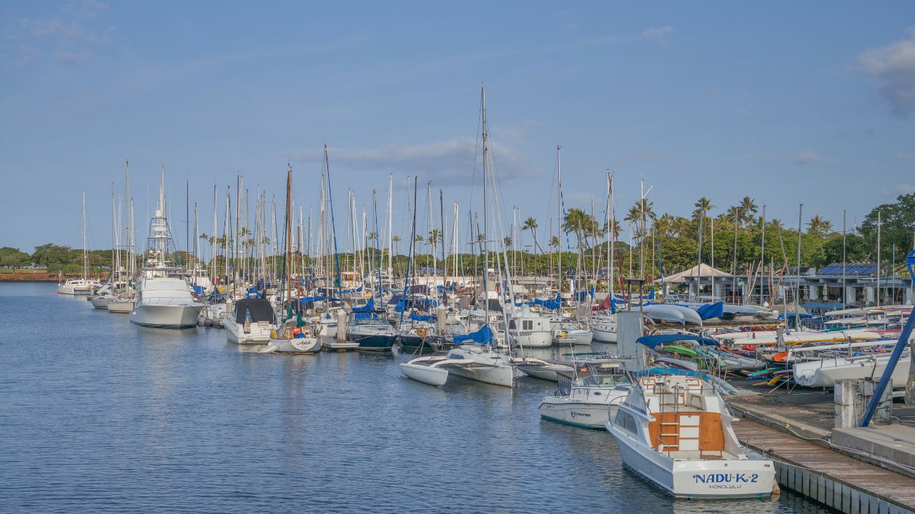Honolulu, Hawaii, USA, July 21, 2016: Early morning view of the Waikiki Yacht Club with Ala Moana Regional Park in the background.