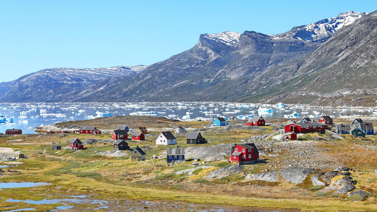 Abandoned fishing village, landscape Greenland, beautiful Nuuk fjord, ocean, iceberg with mountains background