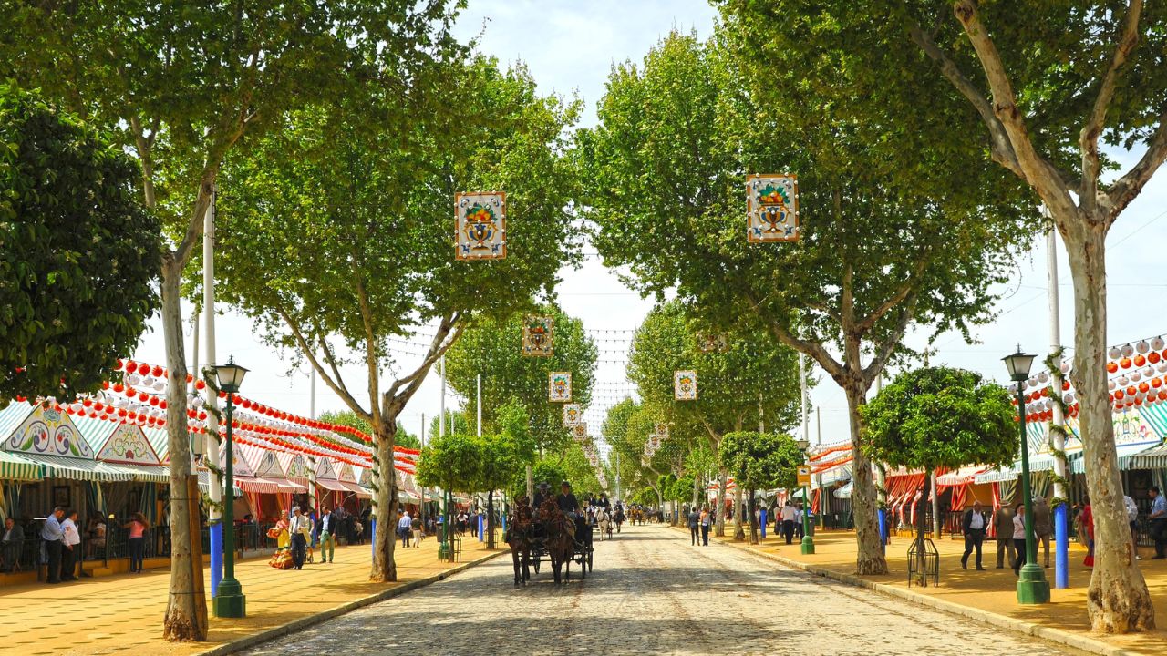 Seville, Spain; Apr 20 2018: Horse carriage ride through the April Fair, Seville Fair, Festivals in Spain. Spring festivals in Seville.