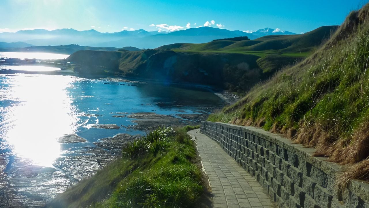 Coastal path and mountains in New Zealand