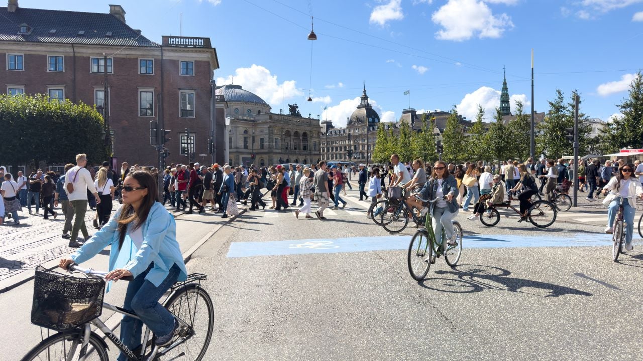 Copenhaguen, Denmark, September 6, 2025, Cyclists and Pedestrians Sharing Busy Intersection in Copenhagen