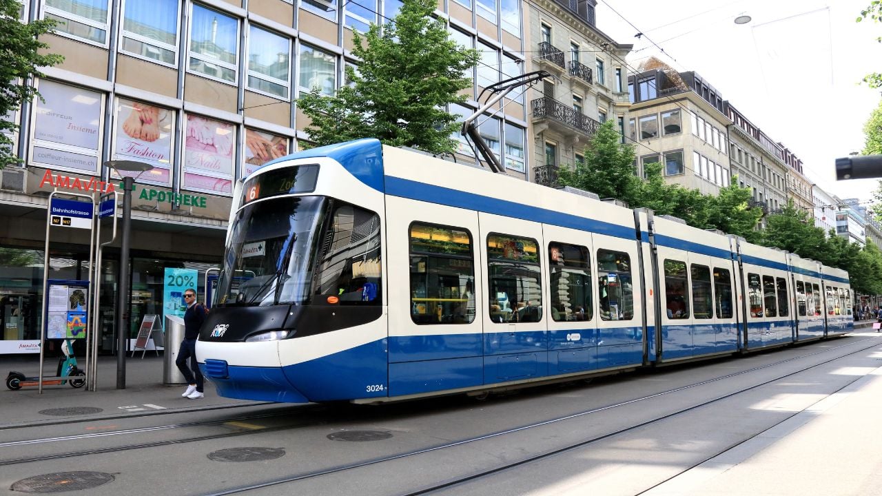 Various trams and city sights in central Zurich: Swiss May 13. 2025.