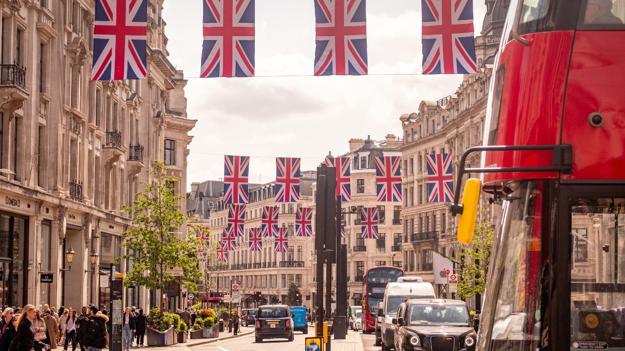 LONDON- MAY 8, 2025: Union flags on display above Regent Street, a landmark shopping destination in London’s West End