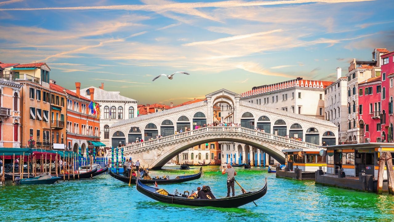 Sunset on the Grand Canal near the Rialto Bridge in Venice, Italy