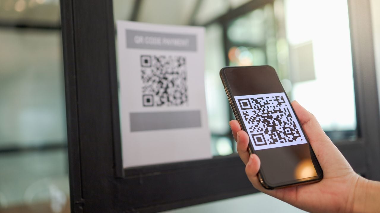 Qr code payment. E wallet. Man scanning tag accepted generate digital pay without money.scanning QR code online shopping cashless technology concept