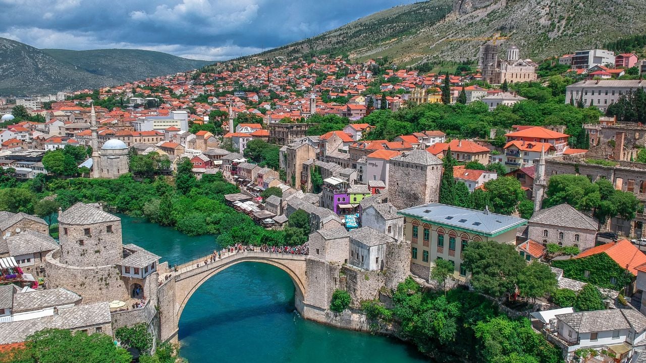 the photo of famous bridge called old bridge in mostar, Bosnia and Herzegovina, taken with a drone