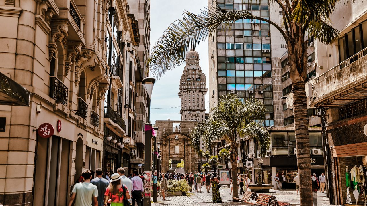 Montevideo, Uruguay - December 22, 2022: Pedestrians on a wide walkway outside of Museo Toerres Garcia in the old town of Montevideo, capital of Uruguay