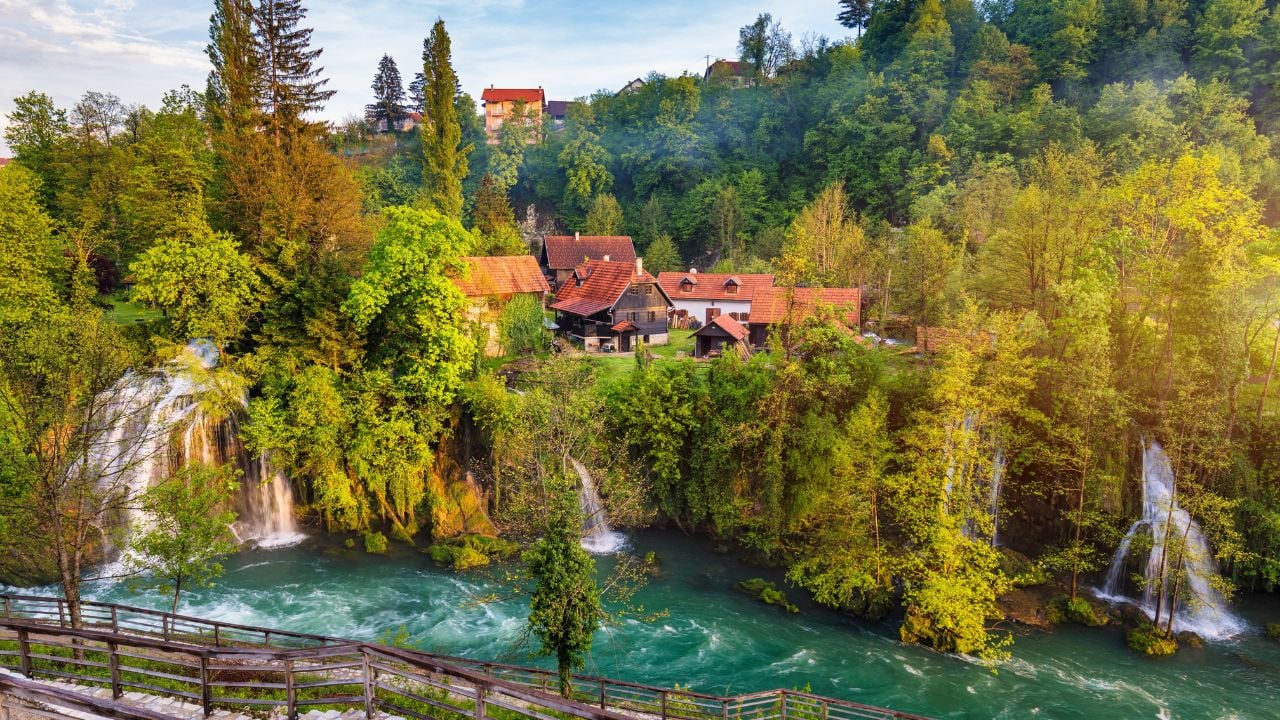 Village of Rastoke near Slunj in Croatia, old water mills on waterfalls of Korana river, beautiful countryside landscape. Landscape with river and little waterfalls in Rastoke village, Croatia.