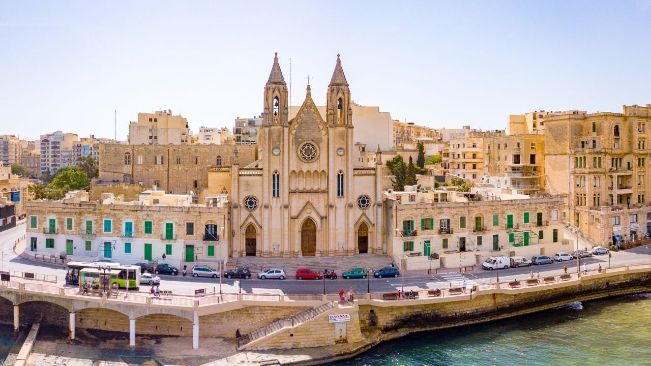 ST.JULIAN'S, MALTA, MAY 15, 2018 - Aerial view on the Spinola Bay with outside pool in St.Julian's from above - St.Julian's, Malta