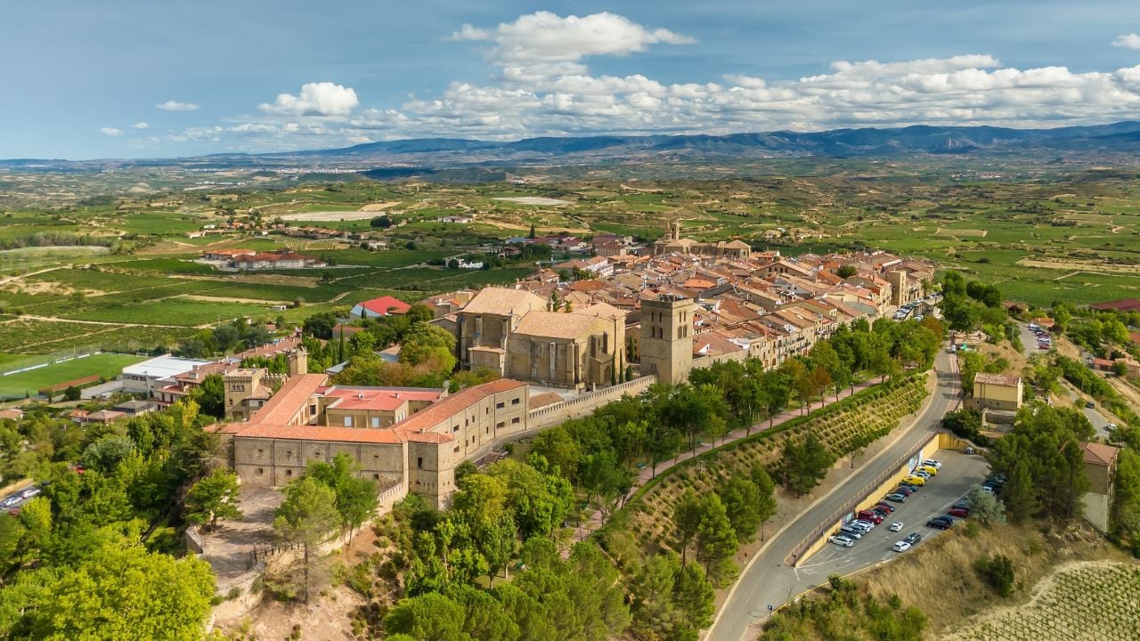 Aerial view of Laguardia medieval fortified hilltop village surrounded by vineries in Basque Country, Spain. La Guardia old town in northern Spain