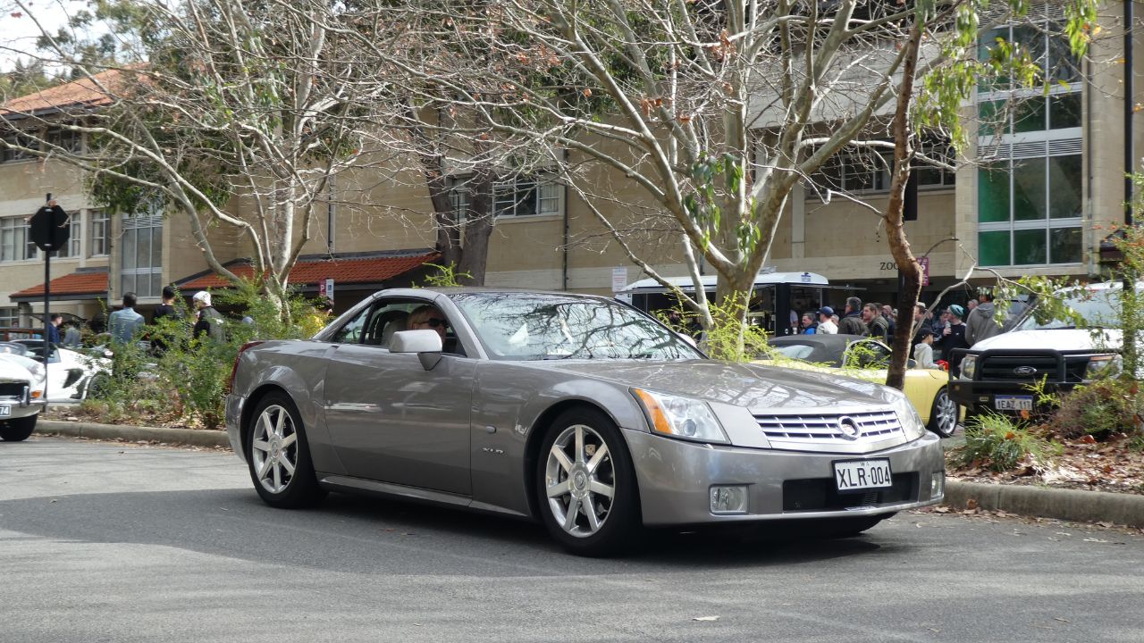 Grey Cadillac XLR front 3/4 view parked