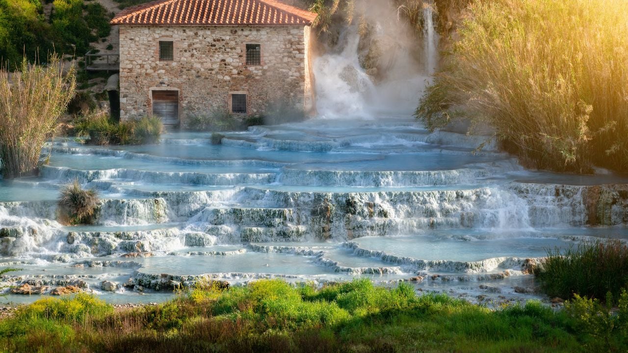 Empty natural spa with turquoise water at Saturnia thermal baths, in Tuscany, Italy. Le Cascate del Mulino is a perfect place to relax in waterfalls and hot springs.