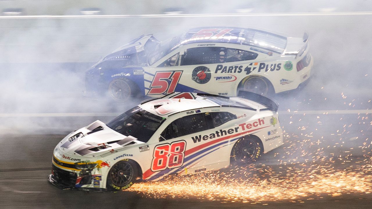 Feb 13, 2025-Daytona Beach, FL; SHANE VAN GISBERGEN (88) of Auckland, NZ , and CODY WARE (51) of Greensboro, NC spin after an on-track incident during the Duels at Daytona