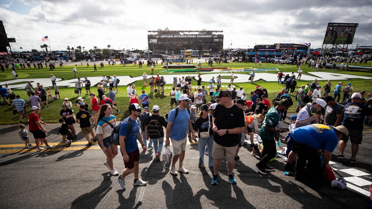Feb 16, 2025-Daytona Beach, FL; Fans take in the sights of Daytona International Speedway prior to the Daytona 500 in Daytona Beach FL.