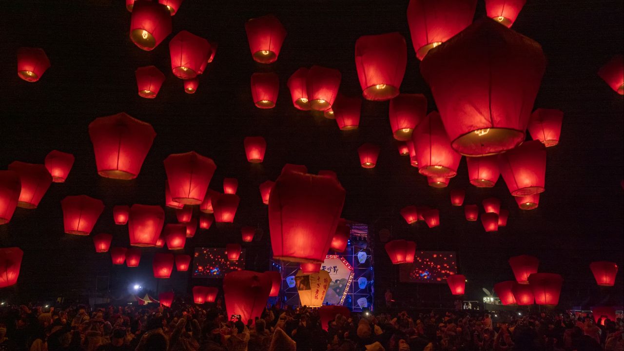 Taiwan, New Taipei - Pingxi, New Taipei, releases sky lanterns at Shifen Square for the Lantern Festival to wish for safety and health on February 15, 2022