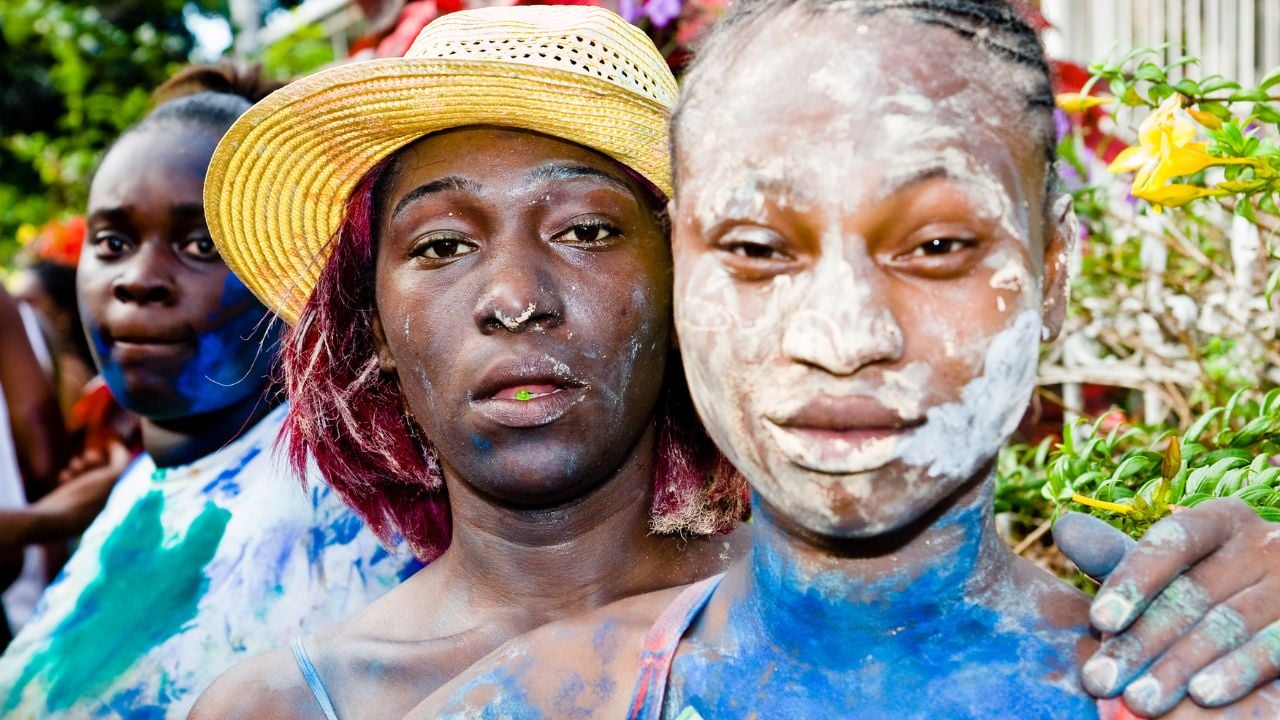PORT OF SPAIN, TRINIDAD W. I. - FEBRUARY 4, 2008: Revellers on J'Ouvert morning after all night street party during Carnival celebrations.