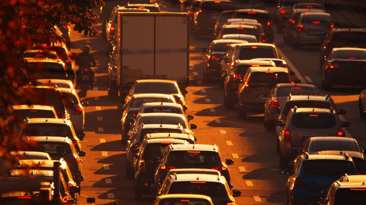 Traffic jam at sunset. Paralyzed traffic on city streets. Selective focus.