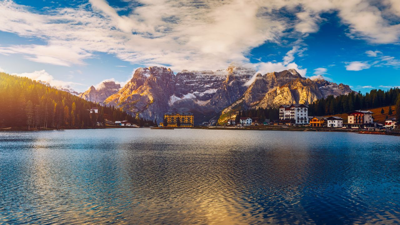 Lake Misurina or Lago di Misurina Italy. Misurina Lake with perfect sky reflection in calm water. Stunning view on the majestic Dolomites Alp Mountains, Italy, National Park Tre Cime di Lavaredo.