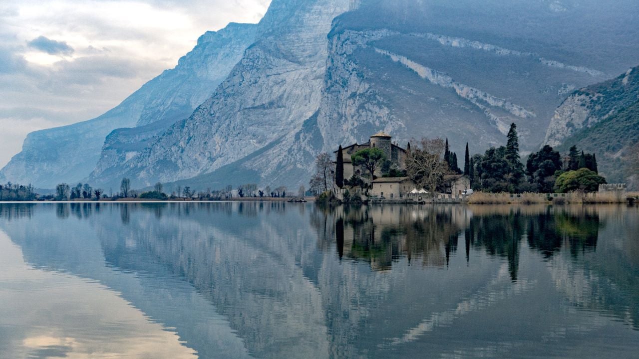 toblino castle view on foggy winter day