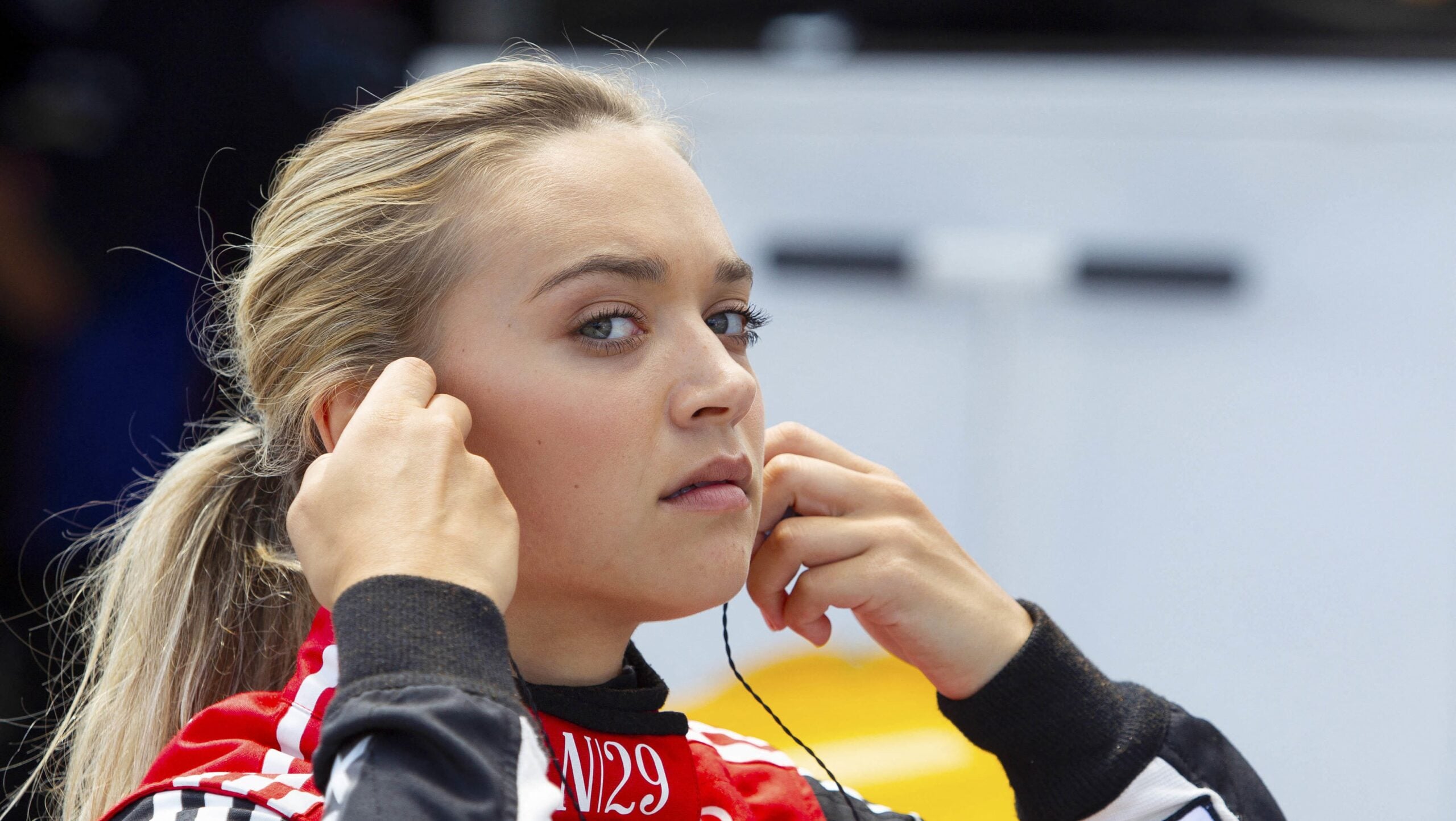 NATALIE DECKER (54) waits in the garage area before practice at Michigan International Speedway.