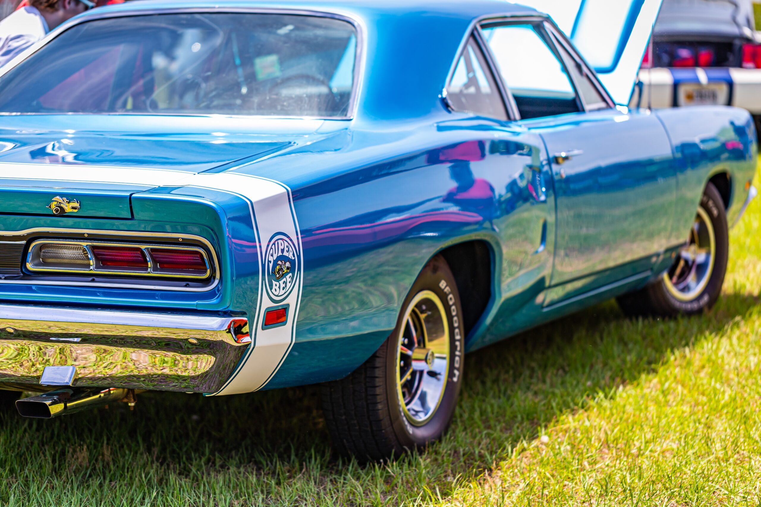 Shallow depth of field closeup of the rear end details on a 1969 Dodge Super Bee hardtop coupe.