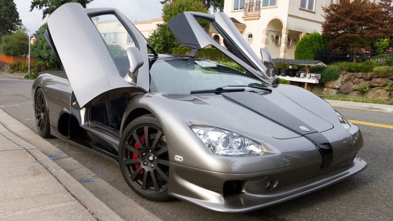 Front 3/4 shot of a Gray SSC Ultimate Aero TT with doors open