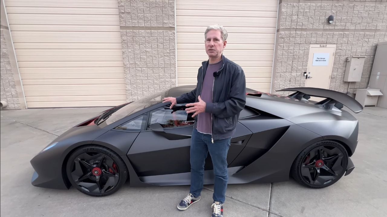 Side view of a Lamborghini Sesto Elemento with owner standing nearby