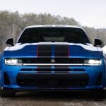 Front view of a Blue SIXPACK-powered 2026 Dodge Charger R/T parked