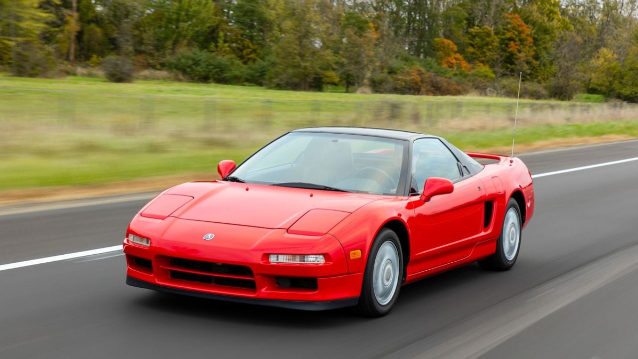 Front 3/4 view of a Red 1991 Acura NSX parked
