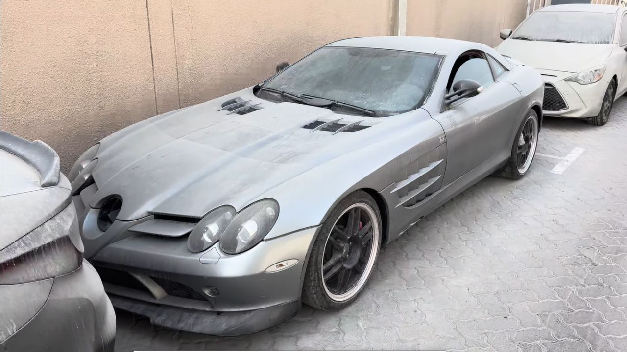 Front 3/4 view of a dust-covered Mercedes-Benz SLR McLaren 722 parked
