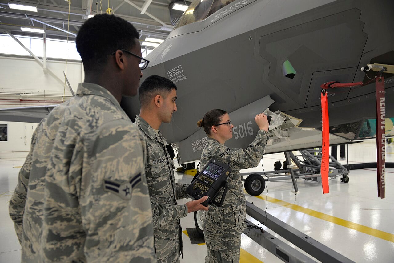 Nondestructive inspection Airmen use a transducer to check for imperfections on an F-35A Lightning II panel at Eglin Air Force base Fla., May 16, 2016.
