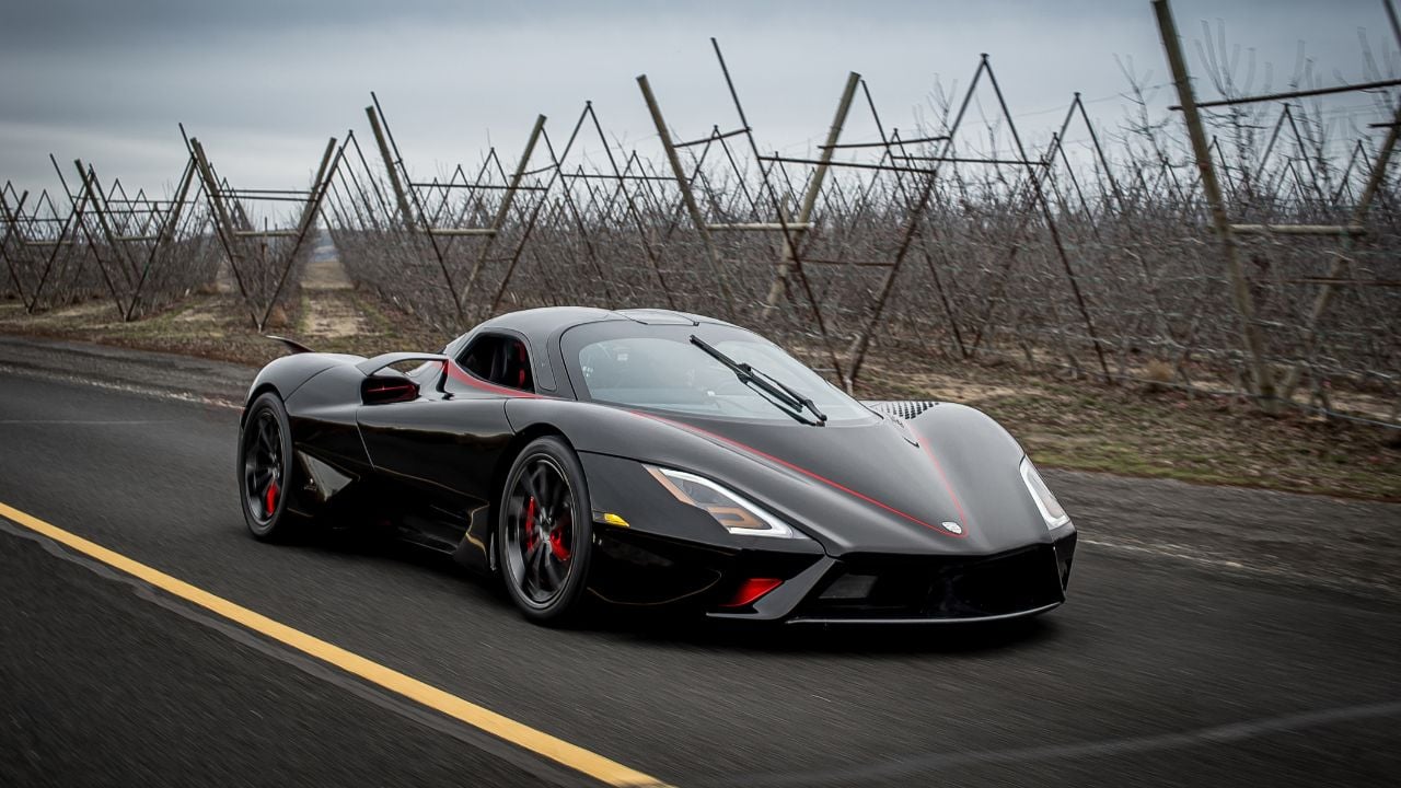 Front 3/4 shot of a Black SSC Tuatara parked