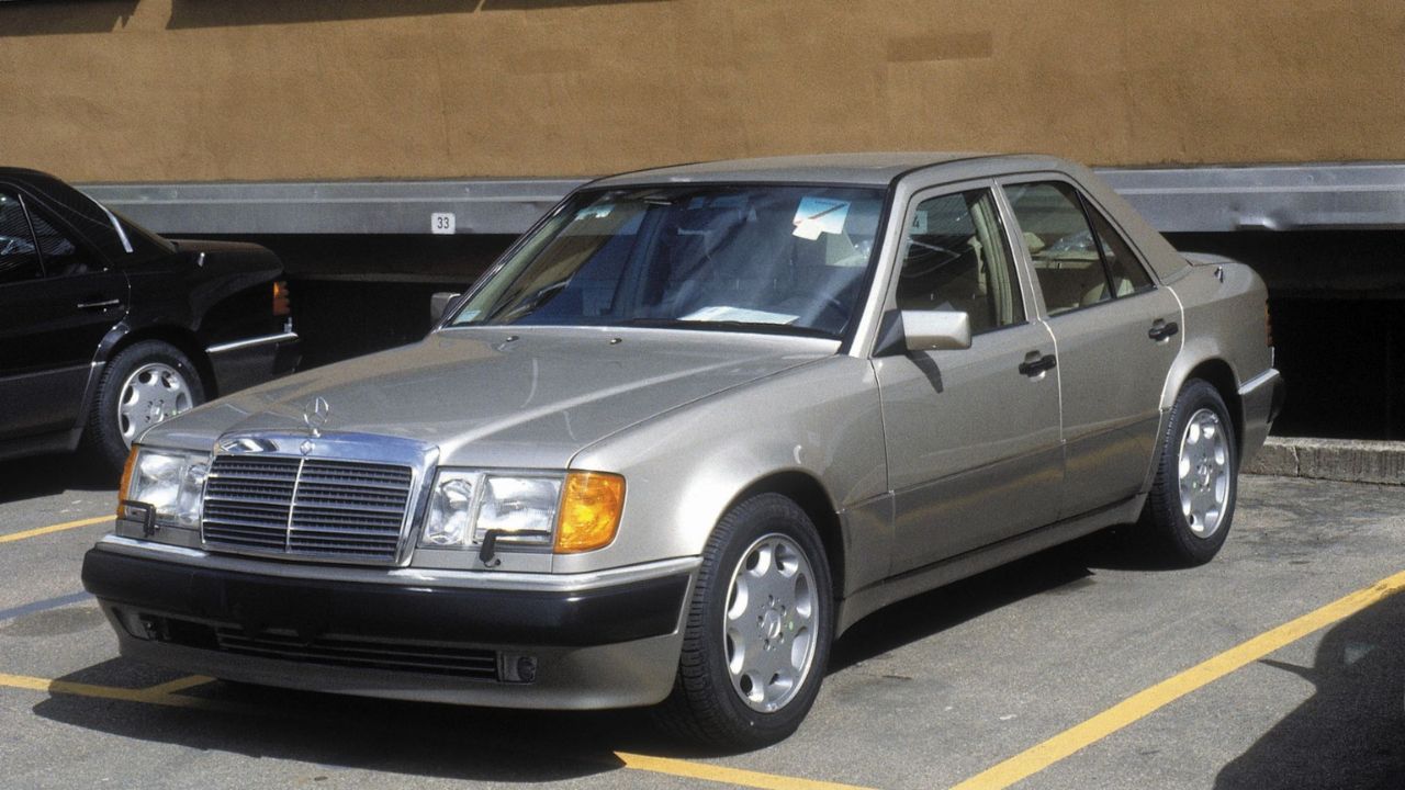 Front 3/4 shot of a Gray Mercedes-Benz 500 E parked