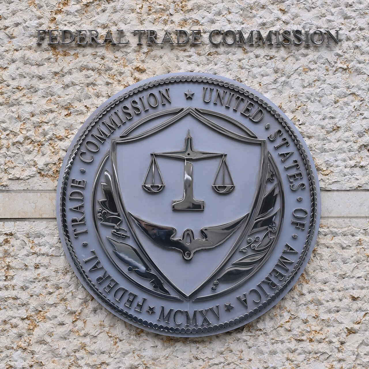 Federal Trade Commission logo on the wall outside of Constitution Center. 400 7th Street SW, Washington, DC 20024.