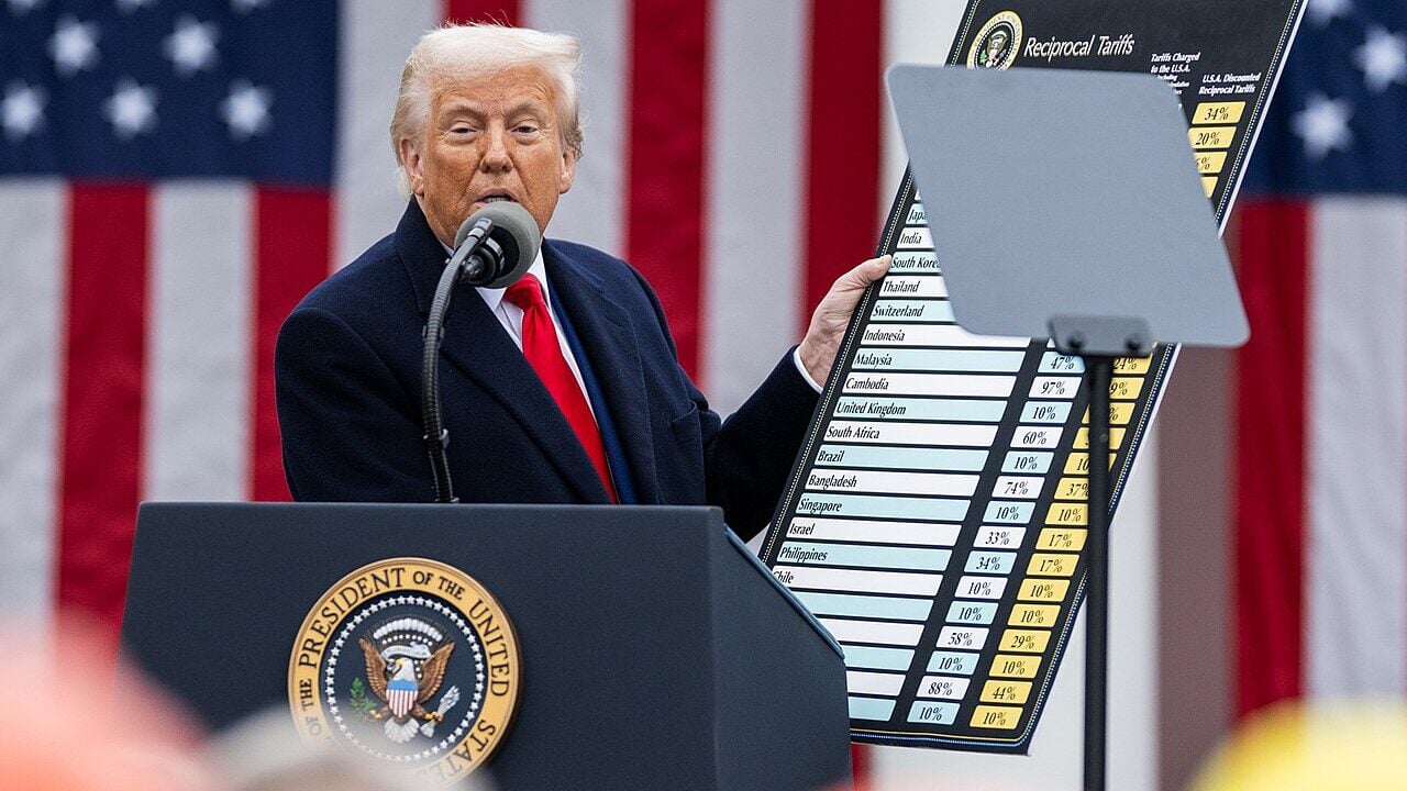 President Donald Trump signs an Executive Order on the Administration’s tariff plans at a “Make America Wealthy Again” event.