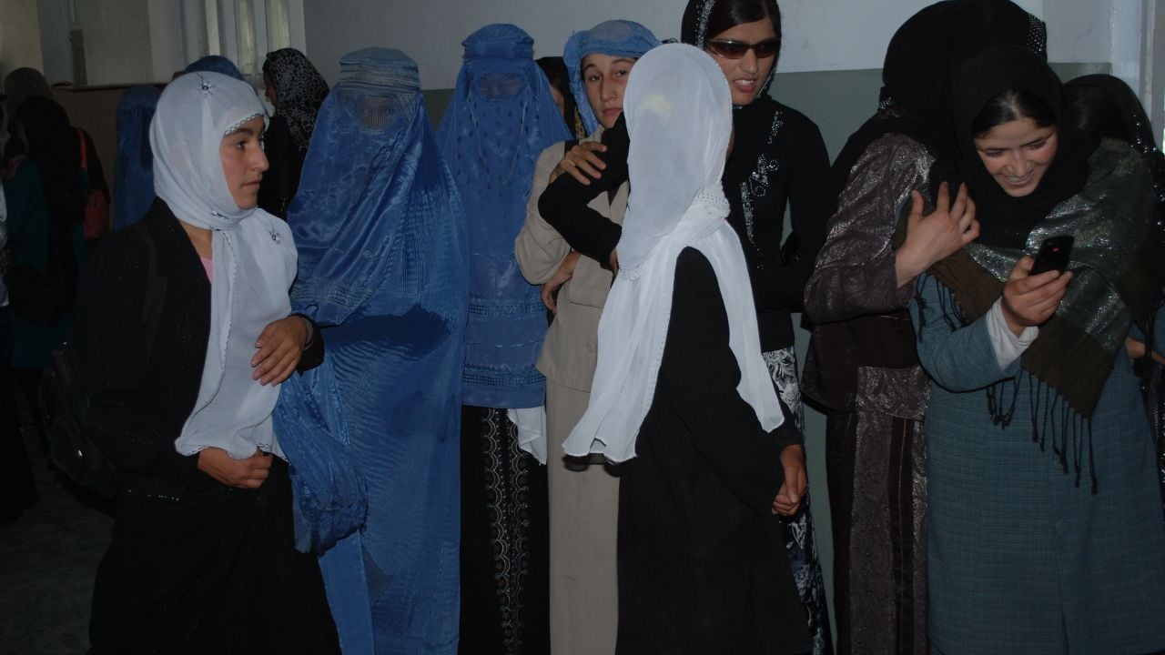 BAHARAK, AFGHANISTAN - AUGUST 12: Afghan school girls, from Baharak, Badakhshan, in school corridor August 12, 2009 in Baharak, northern Afghanistan. Waiting for class to commence.