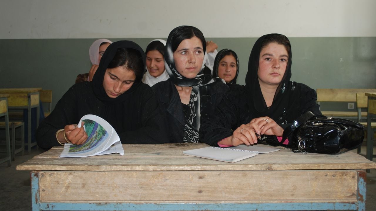 BAHARAK, AFGHANISTAN - AUGUST 12: Afghan girls from Baharak, Badakhshan, in class room August 12, 2009 in Baharak, northern Afghanistan. Attending a lesson.