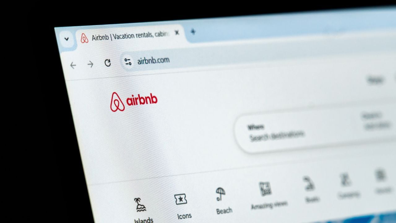 New York, USA - December 15, 2024: Airbnb website homepage displayed on computer screen with visible logo. Online platform for vacation rentals, travel accommodations, and destination bookings