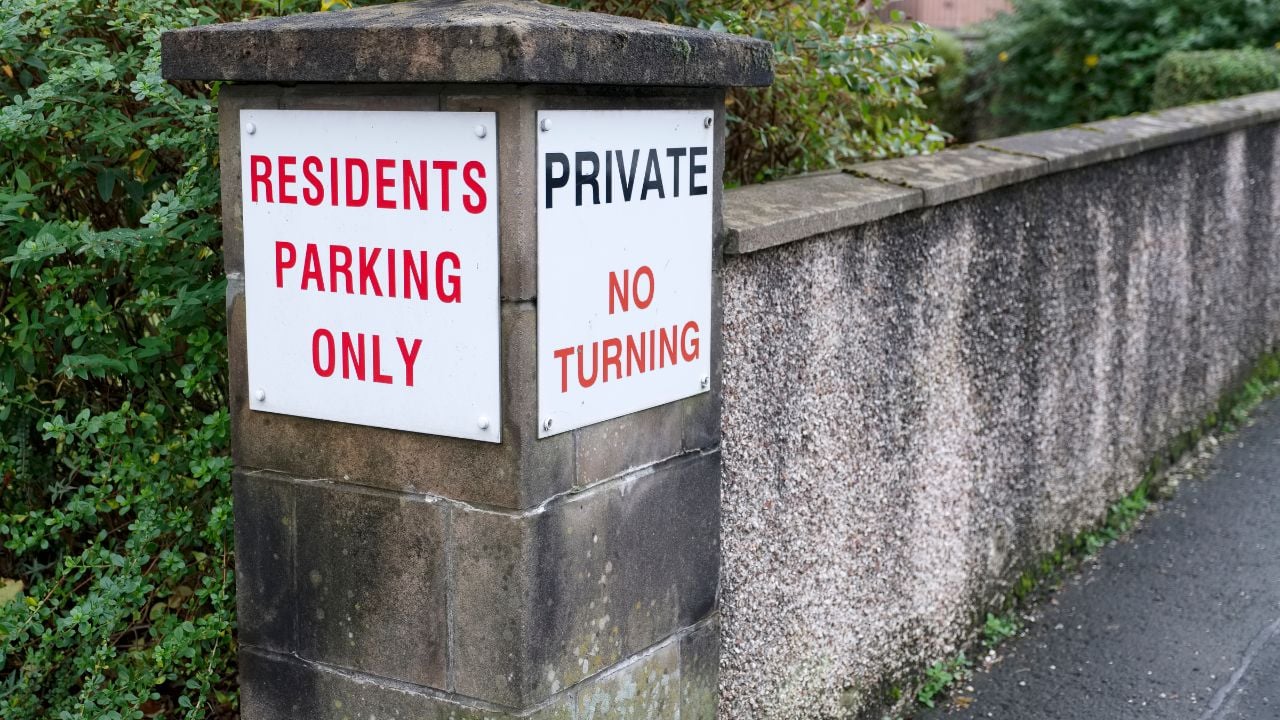 Residents only parking no turning private sign at flats and houses