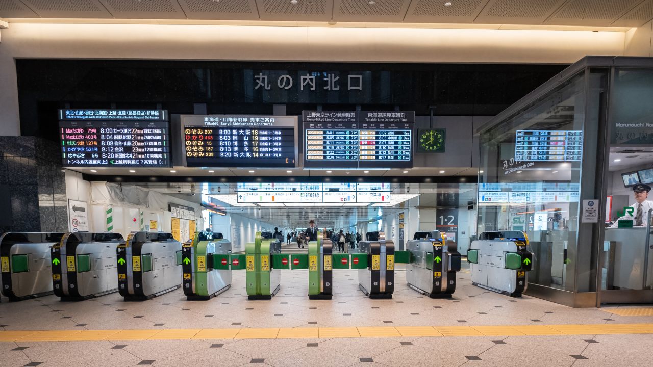 TOKYO, JAPAN - MARCH 20TH, 2019. Commuters at Tokyo Railway Station interior building entrance ticket gate.