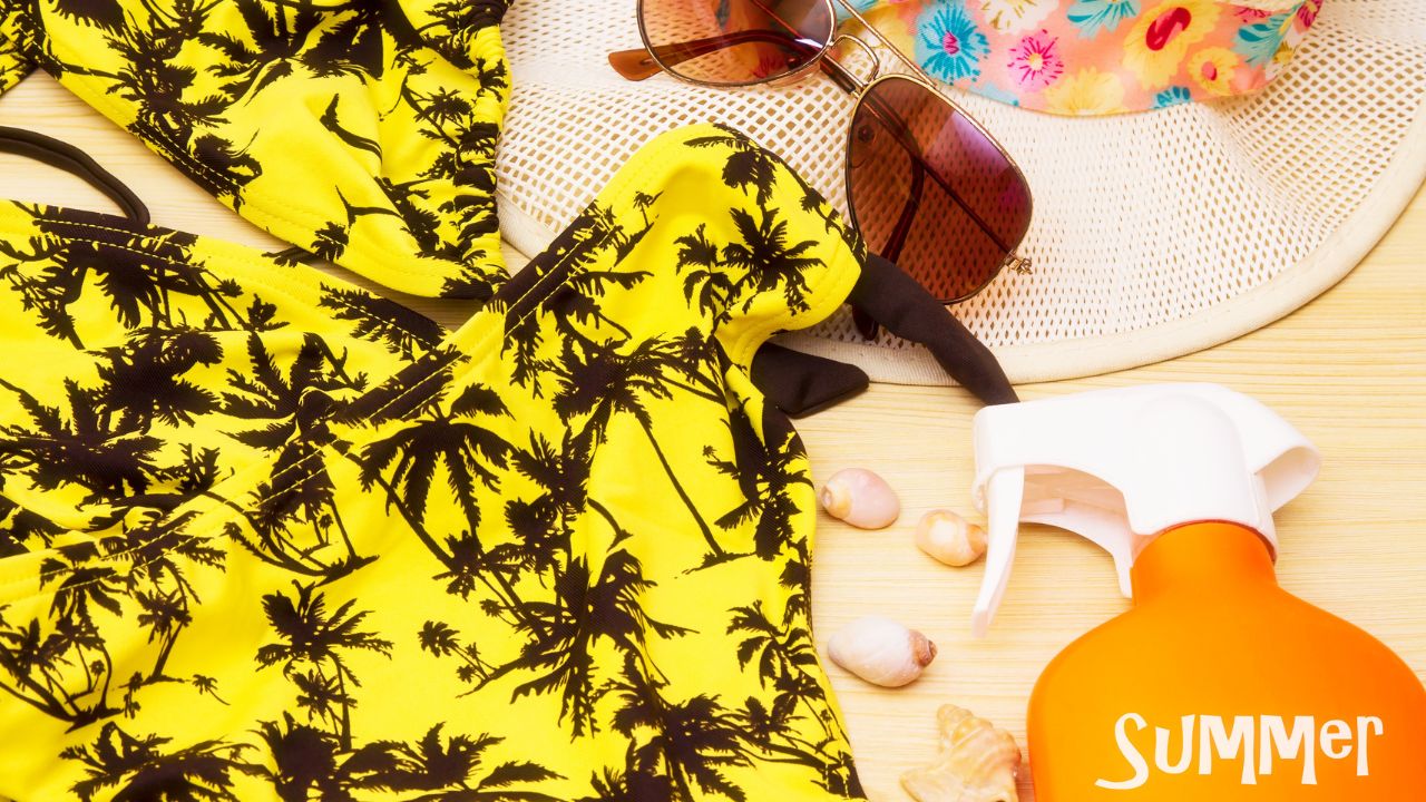 summer accessories, bikini, sunglasses and suntan lotion