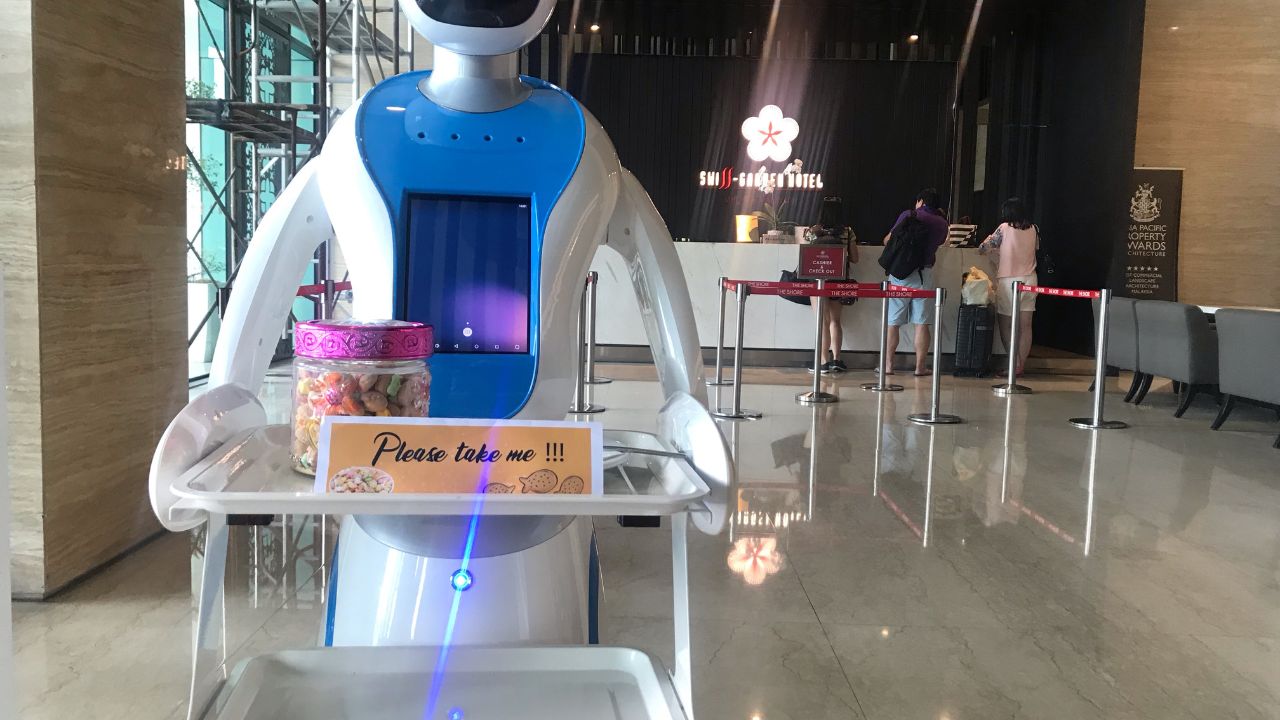 Malacca, Malaysia- Circa April 2019. Swiss garden Malacca using robot to welcome guests and served cookies at entrance hotel lobby.