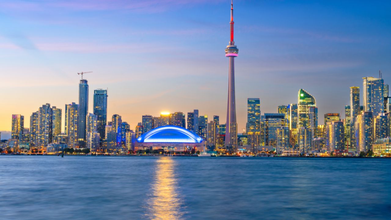Toronto, Ontario, Canada cityscape on Lake Ontario at dusk.