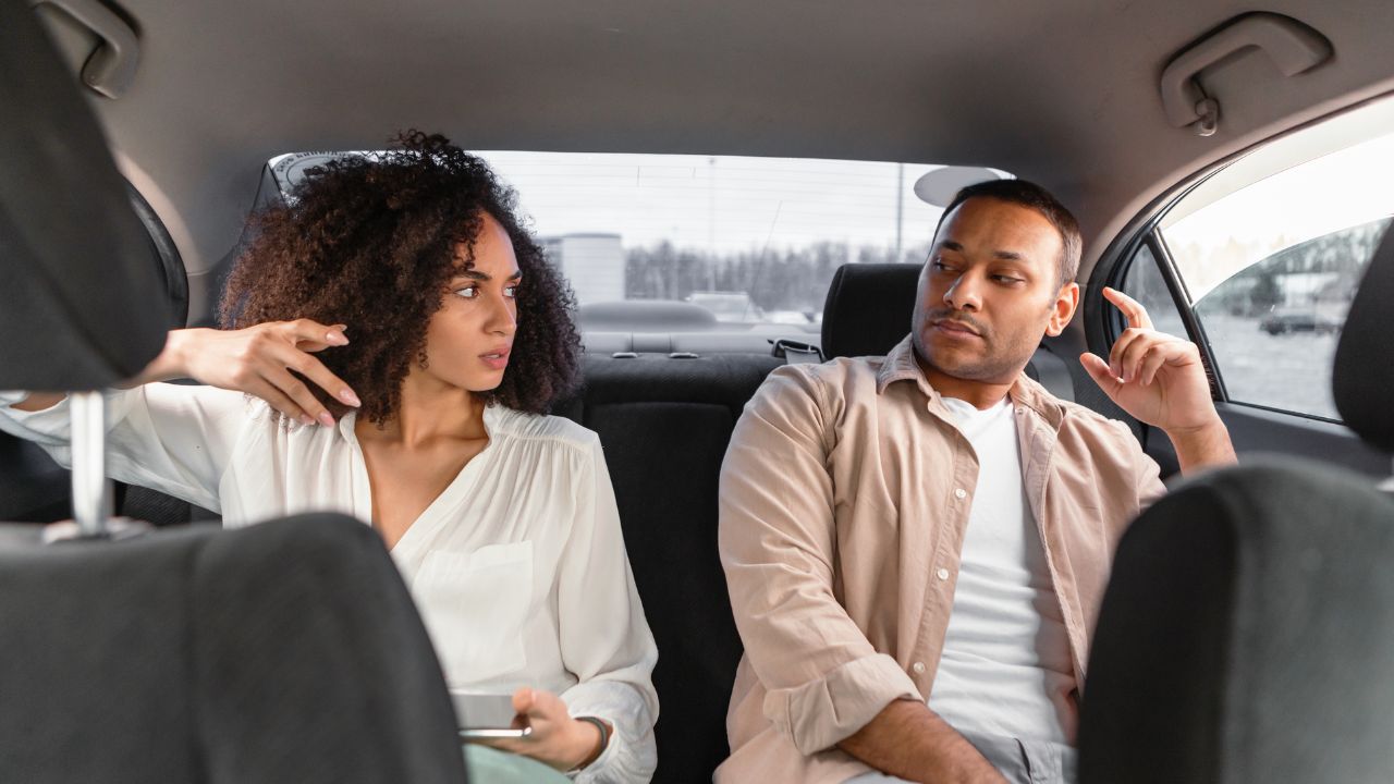 Tense discussion during a taxi ride