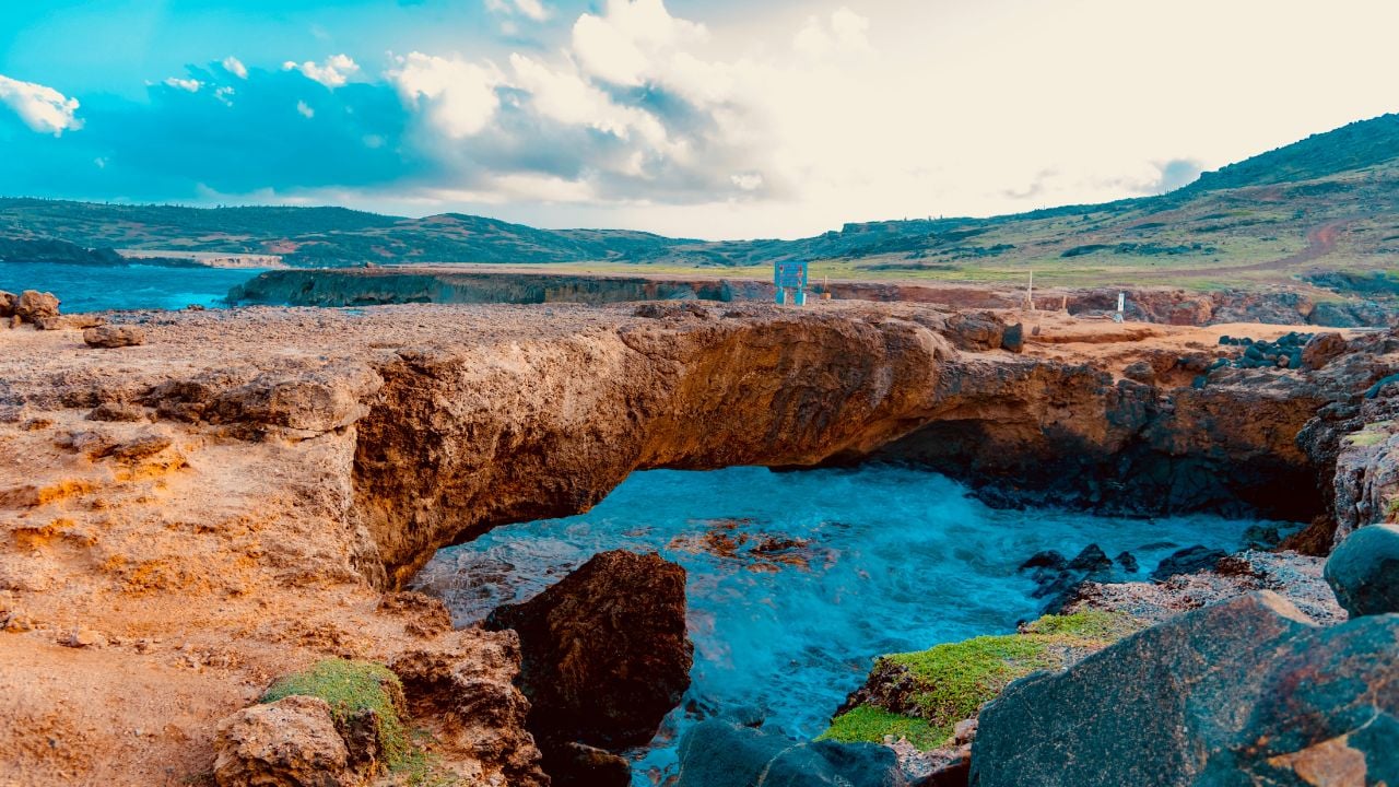 Arikok National Park in Aruba with desert landscape and rocky coastline