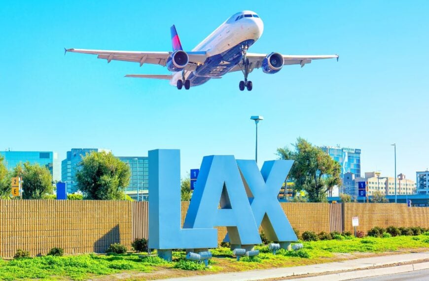 Los Angeles, California - February 1, 2023: Delta Airlines plane takes off over the iconic LAX sign at Los Angeles International Airport