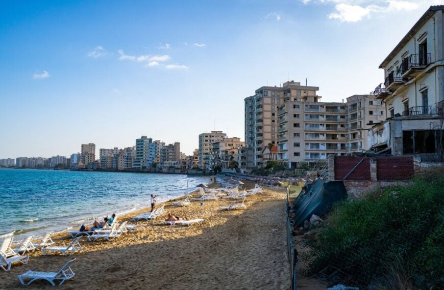 Abandoned buildings in the ghost town Varosha (Kapali Maras) district from Palm Beach. Famagusta (Gazimagusa), Northern Cyprus - November 8 2023.