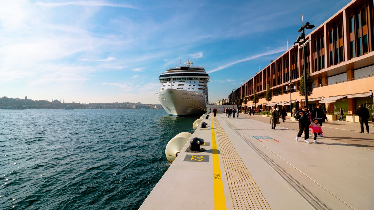 Galataport Istanbul with people walking and a cruise ship in the background