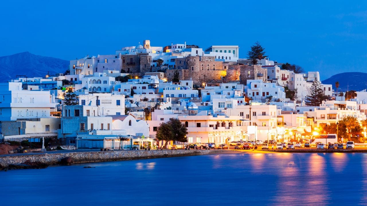 Naxos island aerial panoramic view at night. Naxos is the largest of the Cyclades island group in the Aegean, Greece