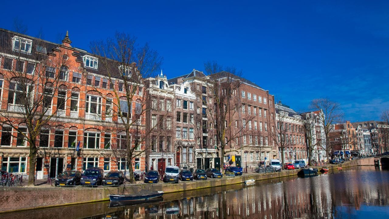 Canals, boats, and historic architecture in central Amsterdam